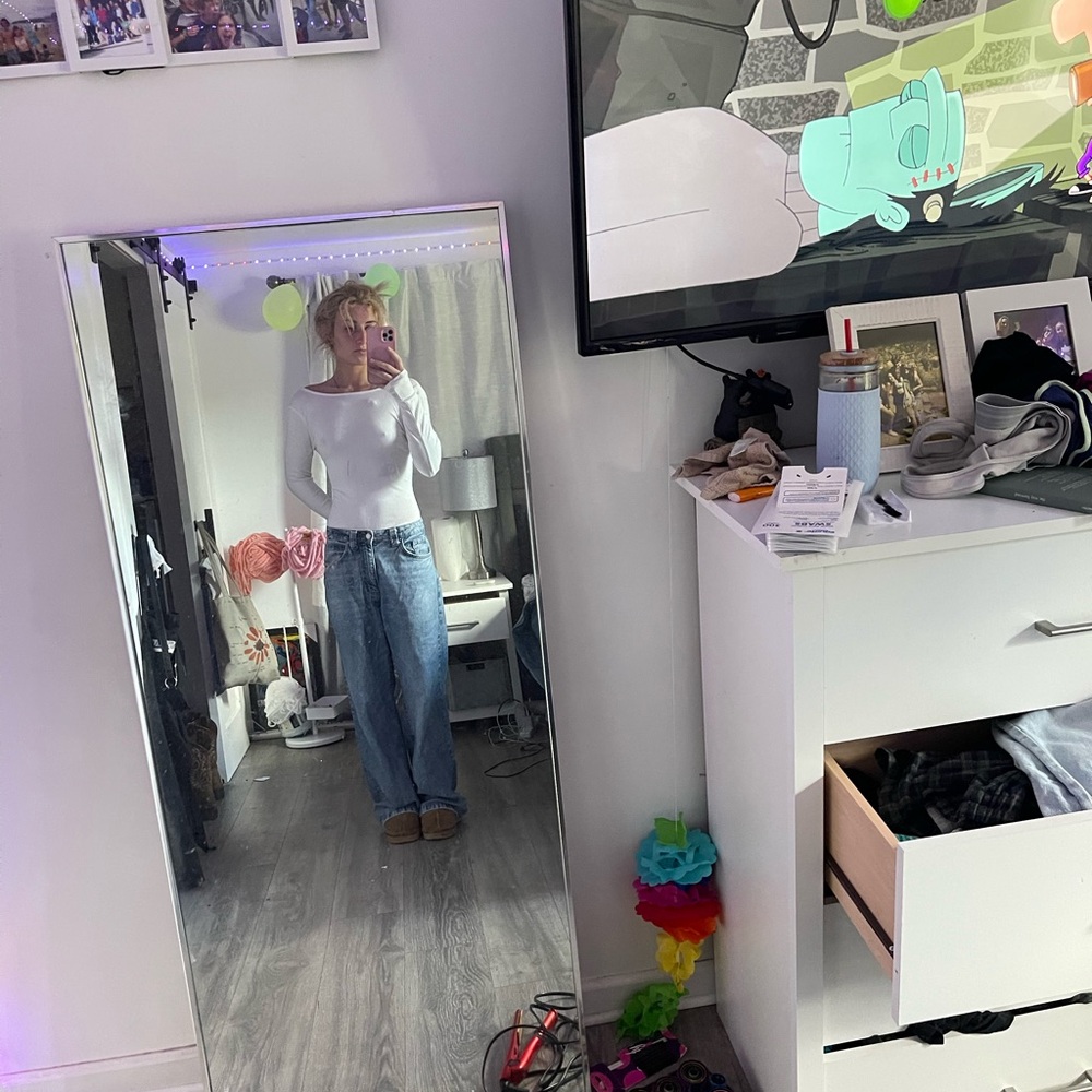 White Long Sleeve Top and Blue Jeans